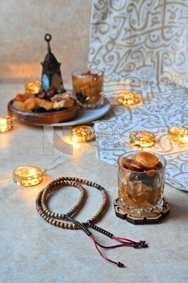 Cup of khoshaf, Dried Fruit, and nuts salad, delicious dessert, Ramadan juice, delicious juice, traditional juice
