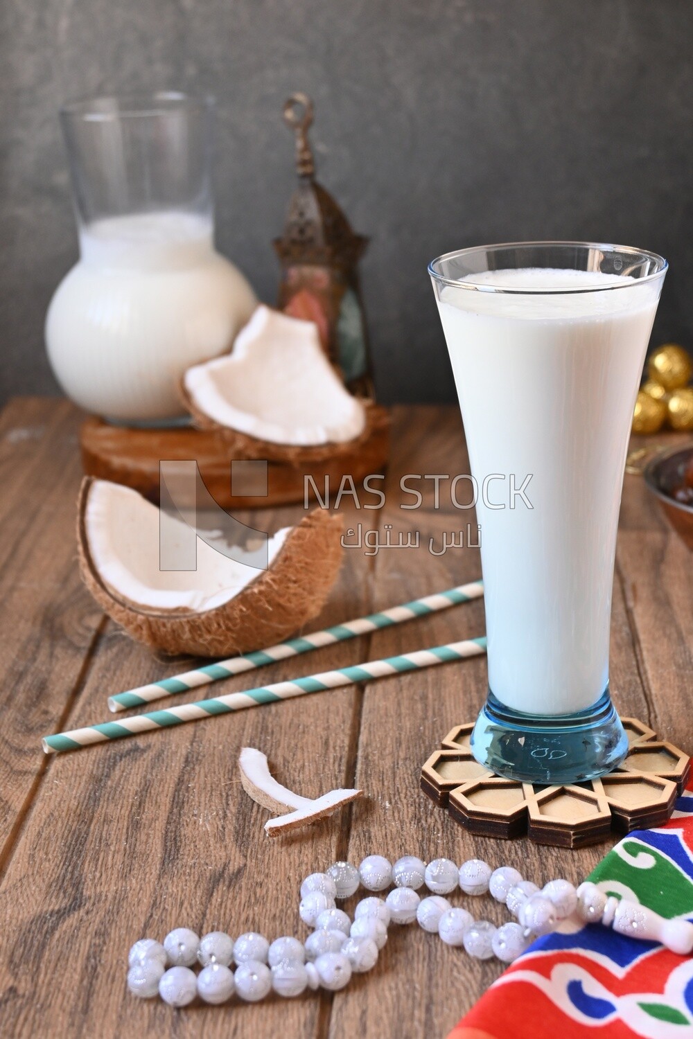 Cup of sobia beside a coconut, delicious dessert, Ramadan juice, delicious juice, traditional juice