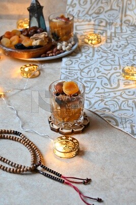 Cup of khoshaf, Dried Fruit, and nuts salad, delicious dessert, Ramadan juice, delicious juice, traditional juice