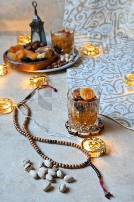 Cup of khoshaf, Dried Fruit, and nuts salad, delicious dessert, Ramadan juice, delicious juice, traditional juice