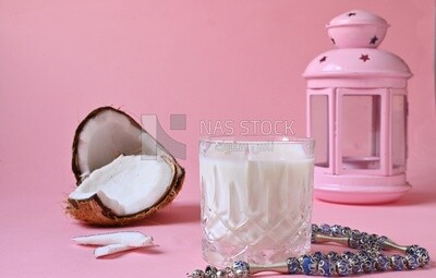 Cup of sobia beside a coconut, delicious dessert, Ramadan juice, delicious juice, traditional juice