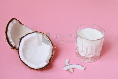 Cup of sobia beside a coconut, delicious dessert, Ramadan juice, delicious juice, traditional juice