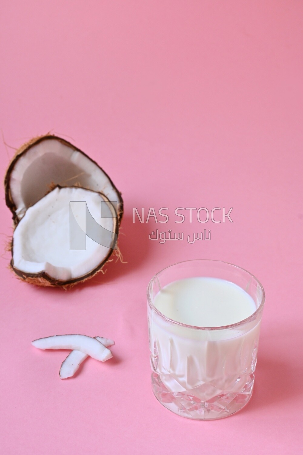 Cup of sobia beside a coconut, delicious dessert, Ramadan juice, delicious juice, traditional juice