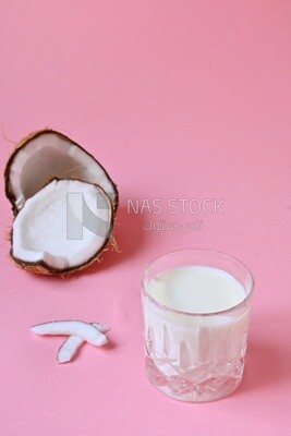 Cup of sobia beside a coconut, delicious dessert, Ramadan juice, delicious juice, traditional juice