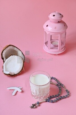 Cup of sobia beside a coconut, delicious dessert, Ramadan juice, delicious juice, traditional juice