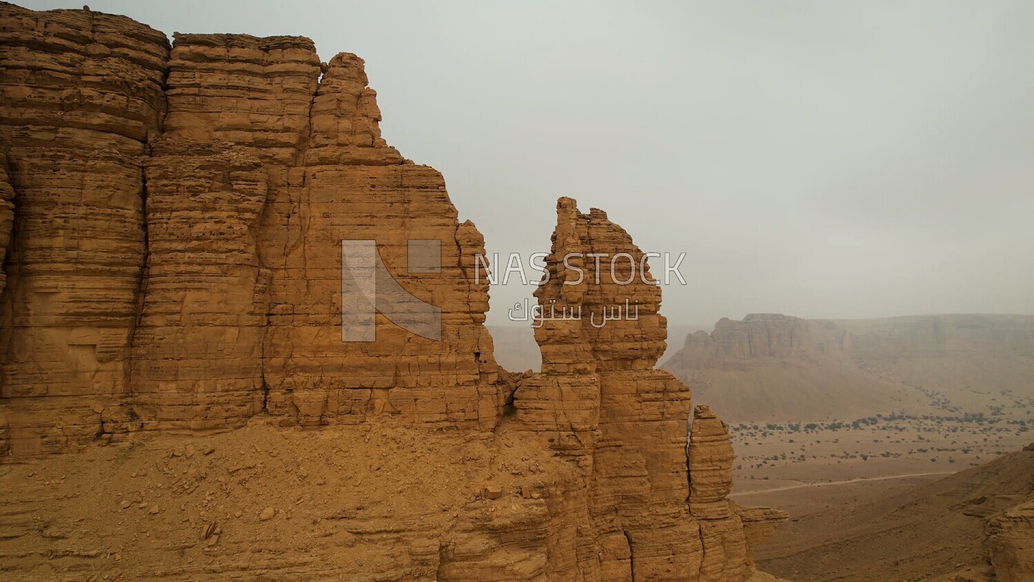 drone footage of the Tuwaiq mountain range in Riyadh in the Kingdom of Saudi Arabia, the edge of the end of the world, overlooking the Grand Canyon.