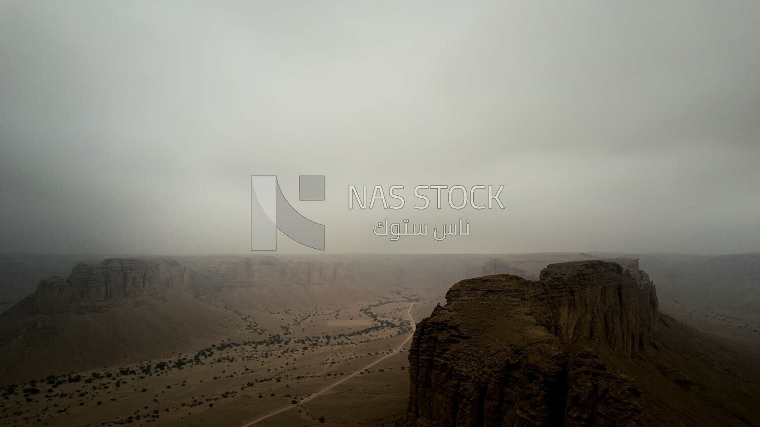 drone footage of the Tuwaiq mountain range in Riyadh in the Kingdom of Saudi Arabia, the edge of the end of the world, overlooking the Grand Canyon.