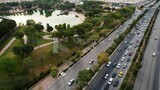 drone footage of Peace Park Lake in Riyadh, view of car traffic, Saudi Arabia, tourist attractions in Riyadh, tourism in Saudi Arabia, natural view, famous Riyadh landmarks.