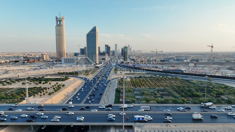 drone footage of the intersections of King Salman Road with King Fahd in Riyadh, Riyadh roads and streets, famous towers in Riyadh.