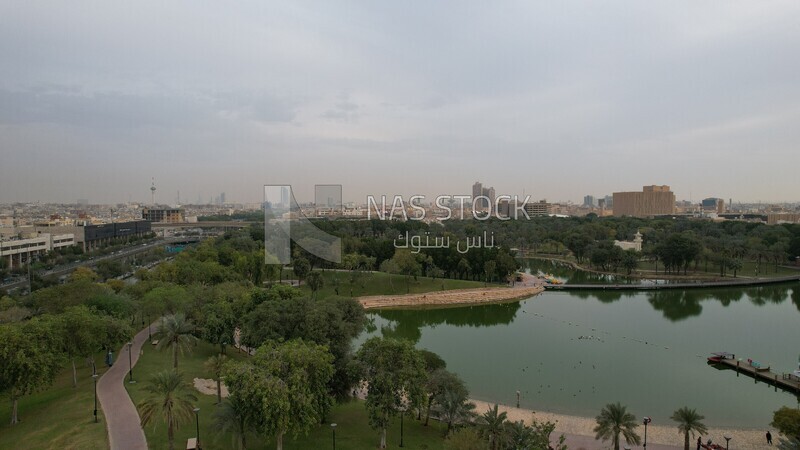 drone footage of Peace Park Lake in Riyadh, Saudi Arabia, tourist attractions in Riyadh, tourism in Saudi Arabia, natural view, famous Riyadh landmarks.