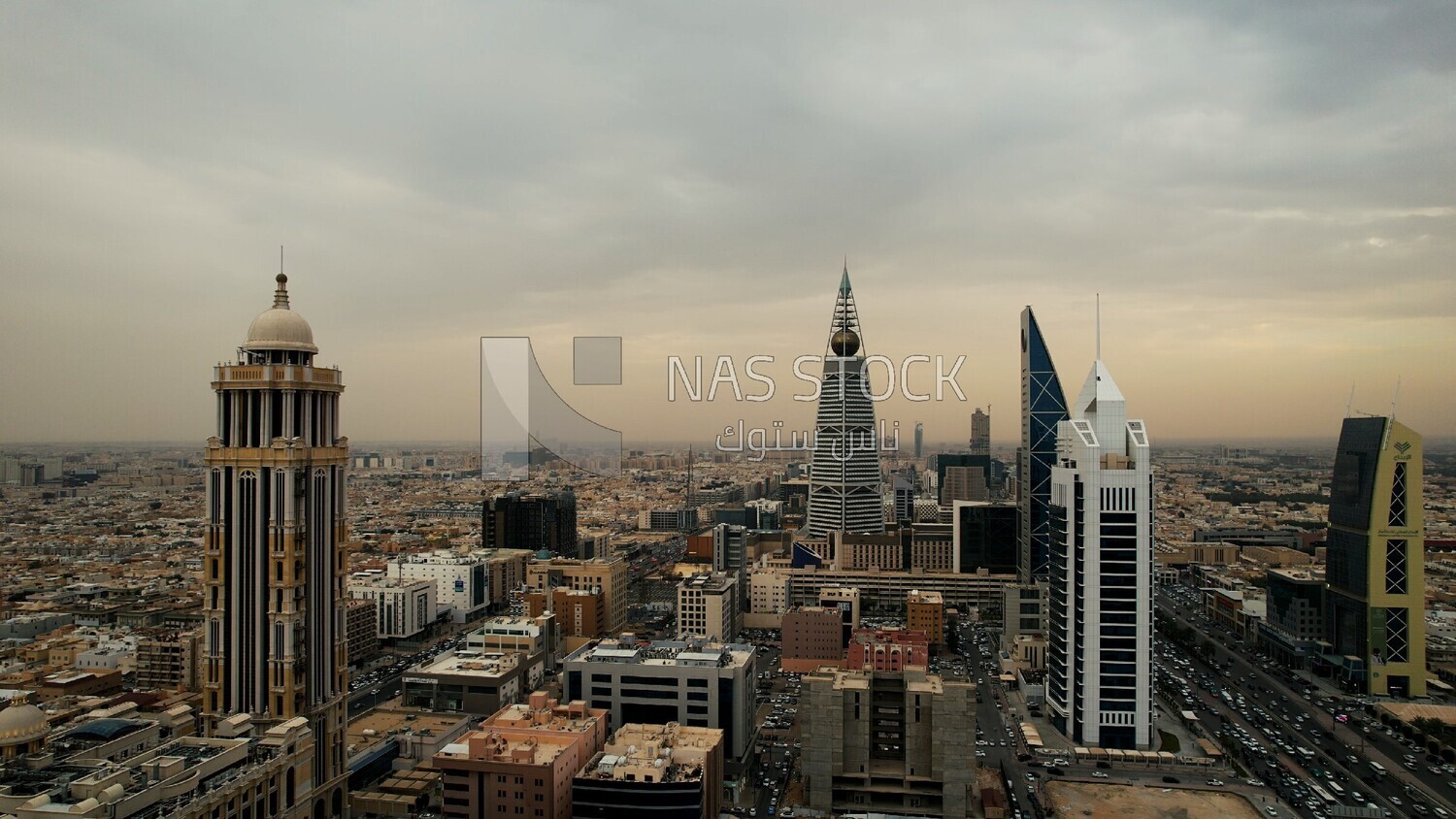 drone footage of the Al Faisaliah Tower in the city of Riyadh in the Kingdom of Saudi Arabia, Saudi Arabia, towers and skyscrapers, Riyadh Towers, famous Riyadh landmarks.