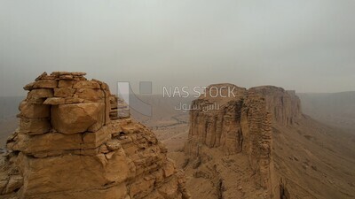 drone footage of the Tuwaiq mountain range in Riyadh in the Kingdom of Saudi Arabia, the edge of the end of the world, overlooking the Grand Canyon.