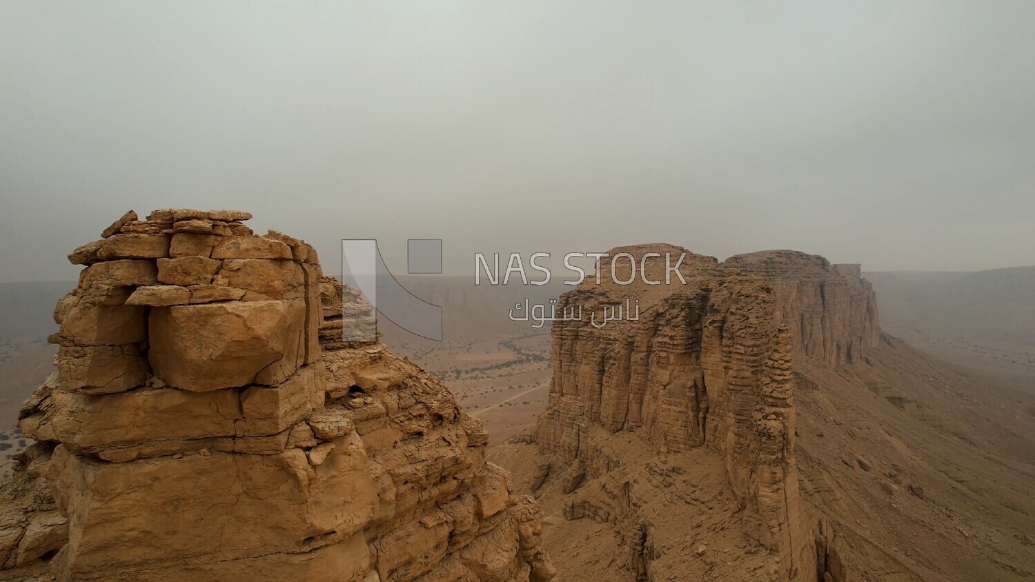 drone footage of the Tuwaiq mountain range in Riyadh in the Kingdom of Saudi Arabia, the edge of the end of the world, overlooking the Grand Canyon.