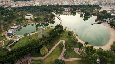 drone footage of Peace Park Lake in Riyadh, Saudi Arabia, tourist attractions in Riyadh, tourism in Saudi Arabia, natural view, famous Riyadh landmarks.