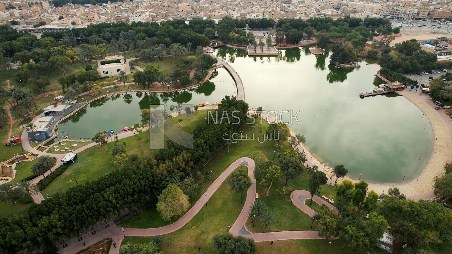 drone footage of Peace Park Lake in Riyadh, Saudi Arabia, tourist attractions in Riyadh, tourism in Saudi Arabia, natural view, famous Riyadh landmarks.