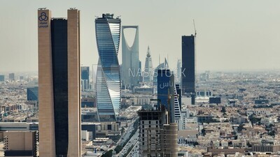 drone footage of King Fahd Road in Riyadh in the Kingdom of Saudi Arabia, Riyadh roads and streets, famous towers in Riyadh, city skyline in Riyadh.