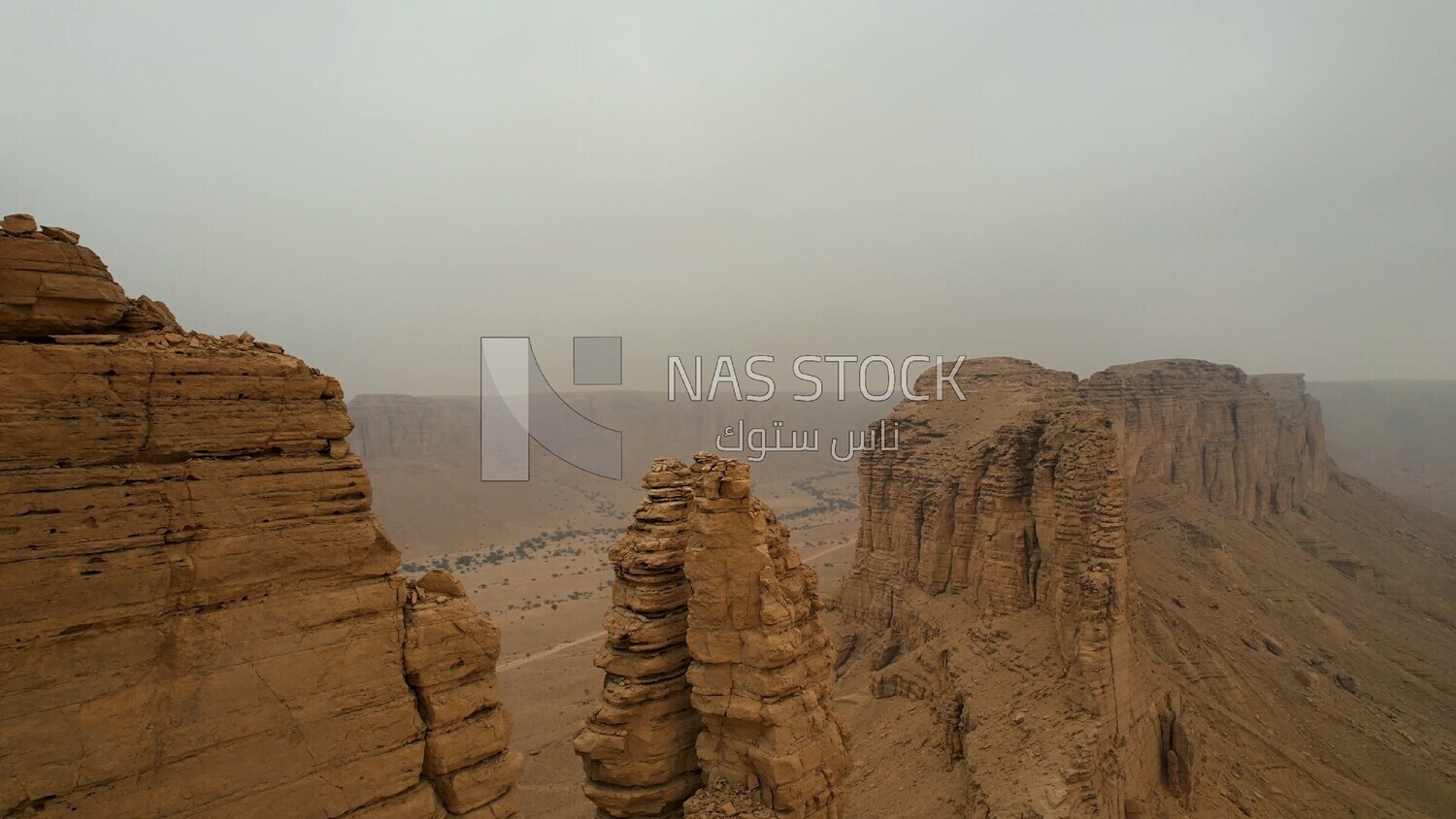drone footage of the Tuwaiq mountain range in Riyadh in the Kingdom of Saudi Arabia, the edge of the end of the world, overlooking the Grand Canyon.