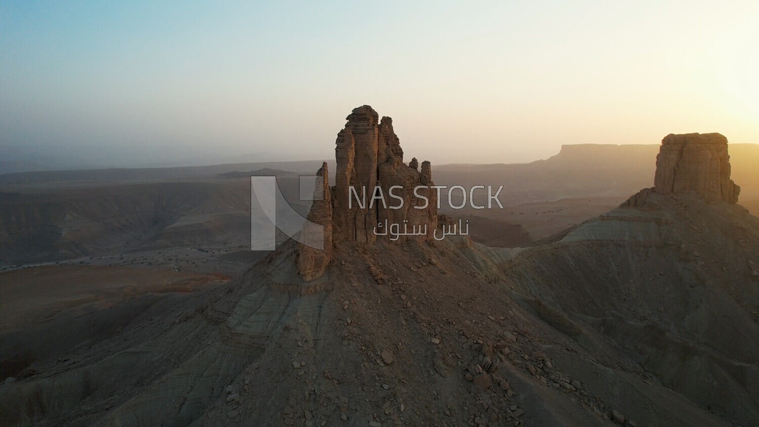 drone footage of the Tuwaiq mountain range in Riyadh in the Kingdom of Saudi Arabia, the edge of the end of the world, overlooking the Grand Canyon.