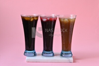 Three cups of Arabian juice served in the holy month of Ramadan, carob, hibiscus, Ramadan drinks, Ramadan Juices