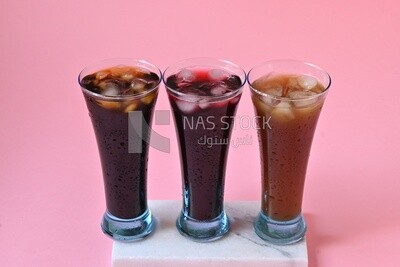 Three cups of Arabian juice served in the holy month of Ramadan, carob, hibiscus, Ramadan drinks, Ramadan Juices