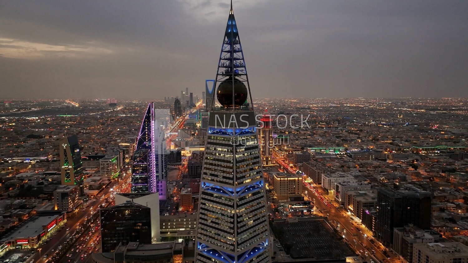 drone footage of the Al Faisaliah Tower in the city of Riyadh in the Kingdom of Saudi Arabia, Saudi Arabia, towers and skyscrapers, Riyadh Towers, famous Riyadh landmarks.HD