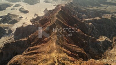 drone footage of the Tuwaiq mountain range in Riyadh in the Kingdom of Saudi Arabia, the edge of the end of the world, overlooking the Grand Canyon.HD