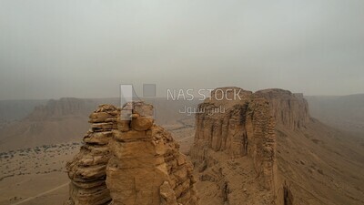 drone footage of the Tuwaiq mountain range in Riyadh in the Kingdom of Saudi Arabia, the edge of the end of the world, overlooking the Grand Canyon.HD