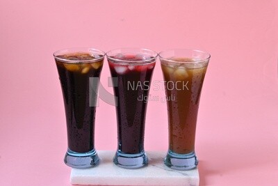 Three cups of Arabian juice served in the holy month of Ramadan, carob, hibiscus, Ramadan drinks, Ramadan Juices
