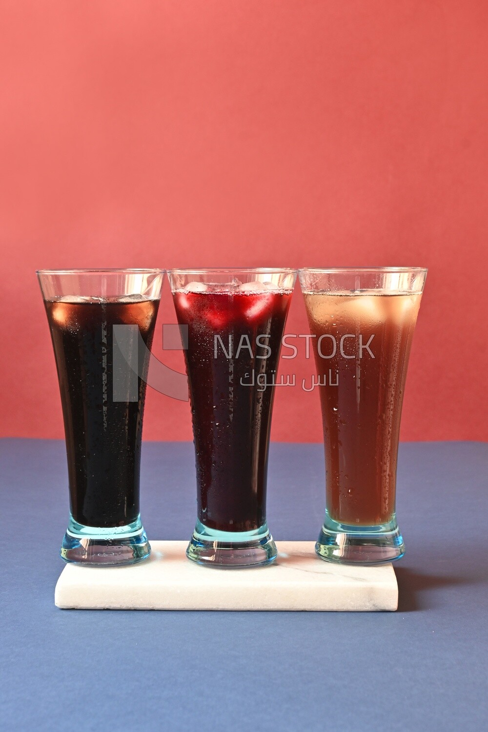 Three cups of Arabian juice served in the holy month of Ramadan, carob, hibiscus, Ramadan drinks, Ramadan Juices