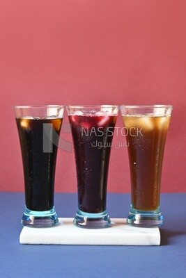 Three cups of Arabian juice served in the holy month of Ramadan, carob, hibiscus, Ramadan drinks, Ramadan Juices