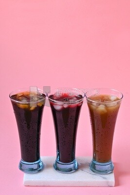 Three cups of Arabian juice served in the holy month of Ramadan, carob, hibiscus, Ramadan drinks, Ramadan Juices