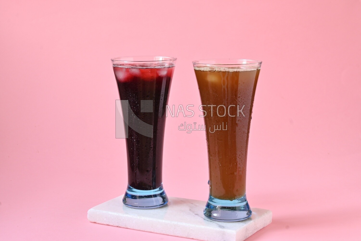 Two cups of Arabian juice served in the holy month of Ramadan, carob, hibiscus, Ramadan drinks, Ramadan Juices