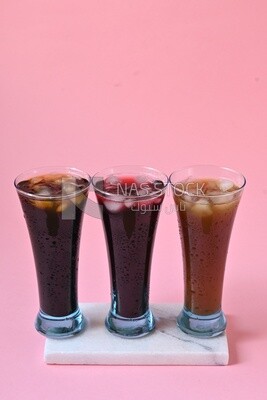 Three cups of Arabian juice served in the holy month of Ramadan, carob, hibiscus, Ramadan drinks, Ramadan Juices