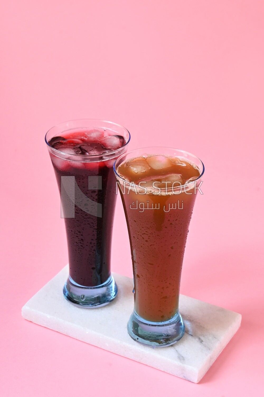 Two cups of Arabian juice served in the holy month of Ramadan, carob, hibiscus, Ramadan drinks, Ramadan Juices