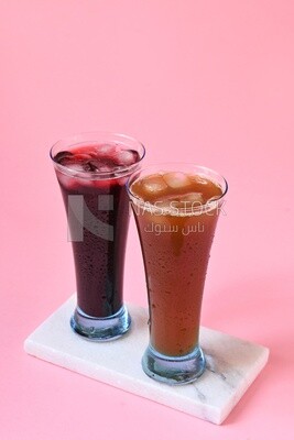 Two cups of Arabian juice served in the holy month of Ramadan, carob, hibiscus, Ramadan drinks, Ramadan Juices