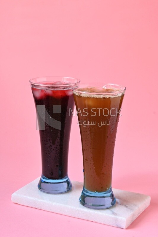 Two cups of Arabian juice served in the holy month of Ramadan, carob, hibiscus, Ramadan drinks, Ramadan Juices