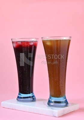 Two cups of Arabian juice served in the holy month of Ramadan, carob, hibiscus, Ramadan drinks, Ramadan Juices