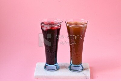 Two cups of Arabian juice served in the holy month of Ramadan, carob, hibiscus, Ramadan drinks, Ramadan Juices