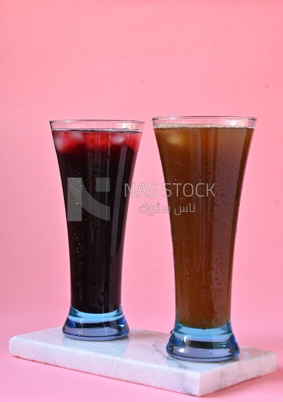 Two cups of Arabian juice served in the holy month of Ramadan, carob, hibiscus, Ramadan drinks, Ramadan Juices