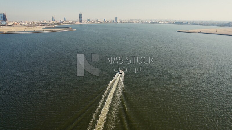 drone footage of a boat in the sea in the marine destination of Dammam in Saudi Arabia, the beauty of the city of Dammam in the eastern region of the Kingdom of Saudi Arabia, Dammam Port.HD