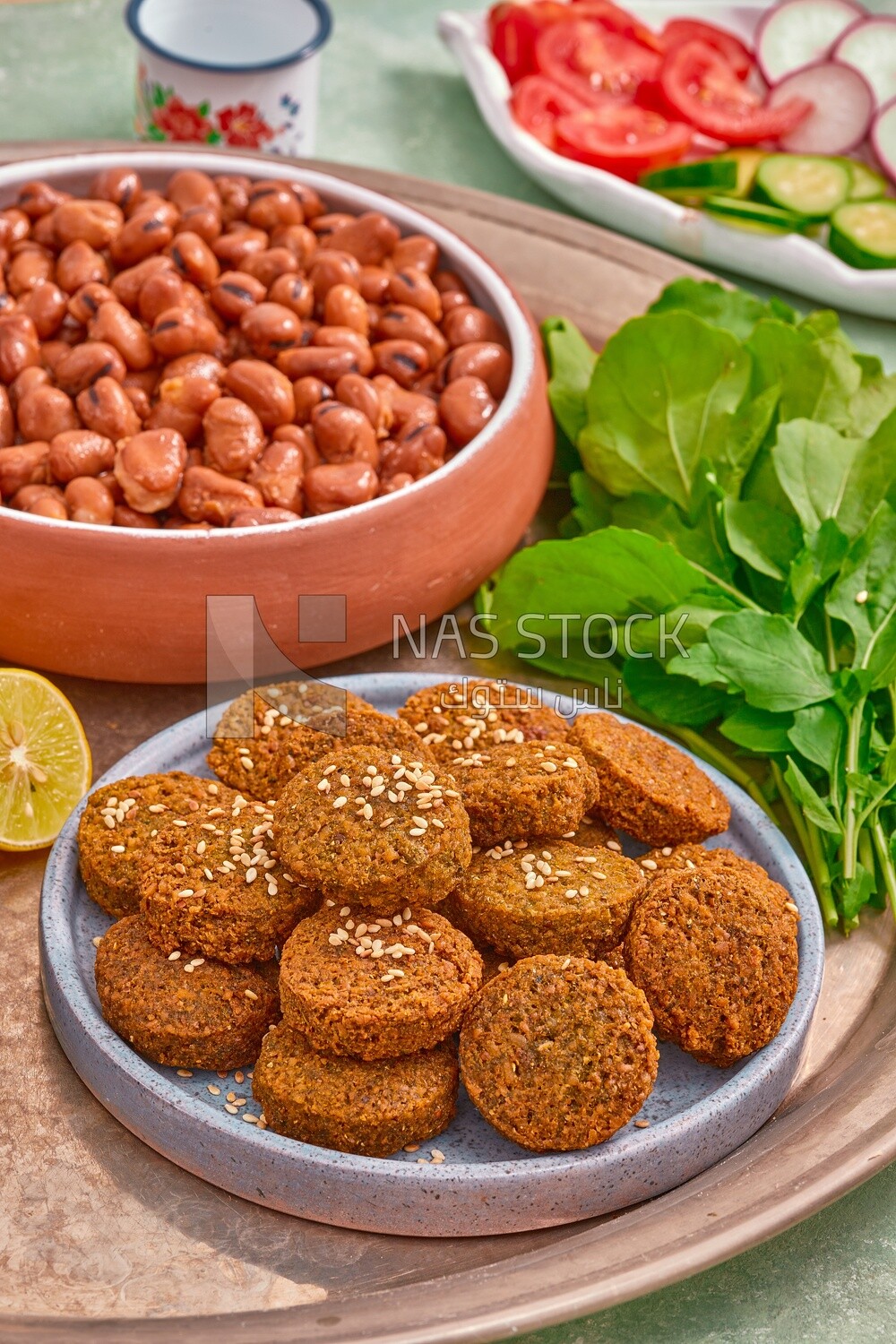 close-up of oriental breakfast, a dish of foul medames, falafel tablets, Arabic breakfast, arab restaurant
