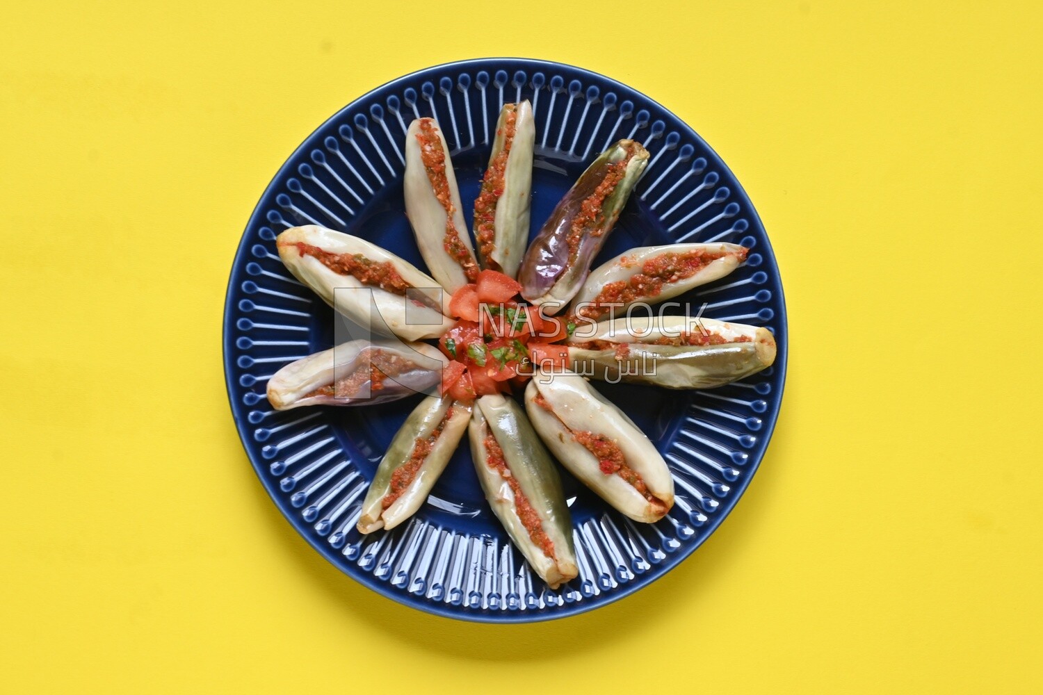 Plate of Pickled eggplant with sauce in it, Egyptian pickles, Arabic restaurants