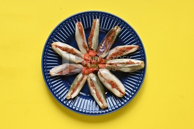 Plate of Pickled eggplant with sauce in it, Egyptian pickles, Arabic restaurants