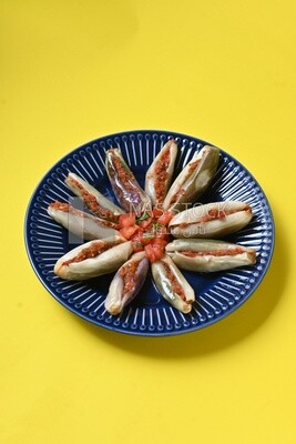 Plate of Pickled eggplant with sauce in it, Egyptian pickles, Arabic restaurants
