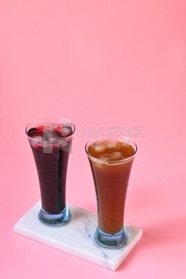 Two cups of Arabian juice served in the holy month of Ramadan, carob, hibiscus, Ramadan drinks, Ramadan Juices