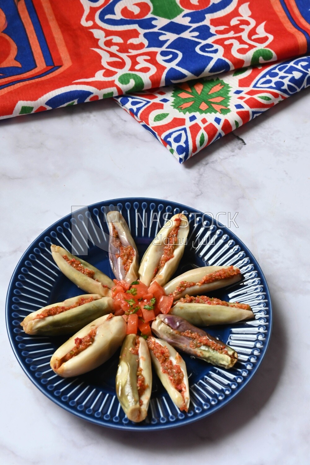 Plate of Pickled eggplant with sauce in it, Egyptian pickles, Arabic restaurants