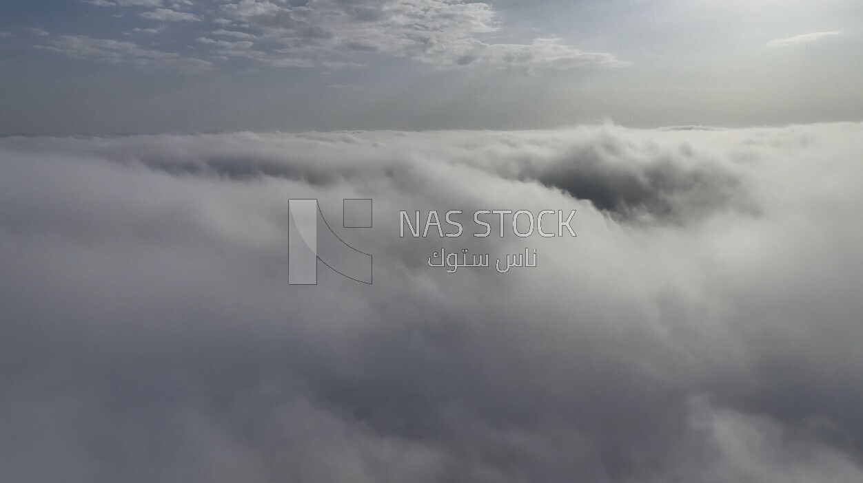 drone footage of clouds in Riyadh,  tourism in Saudi Arabia, King Abdullah Financial District (KAFD) Metro Station, Riyadh towers.HD