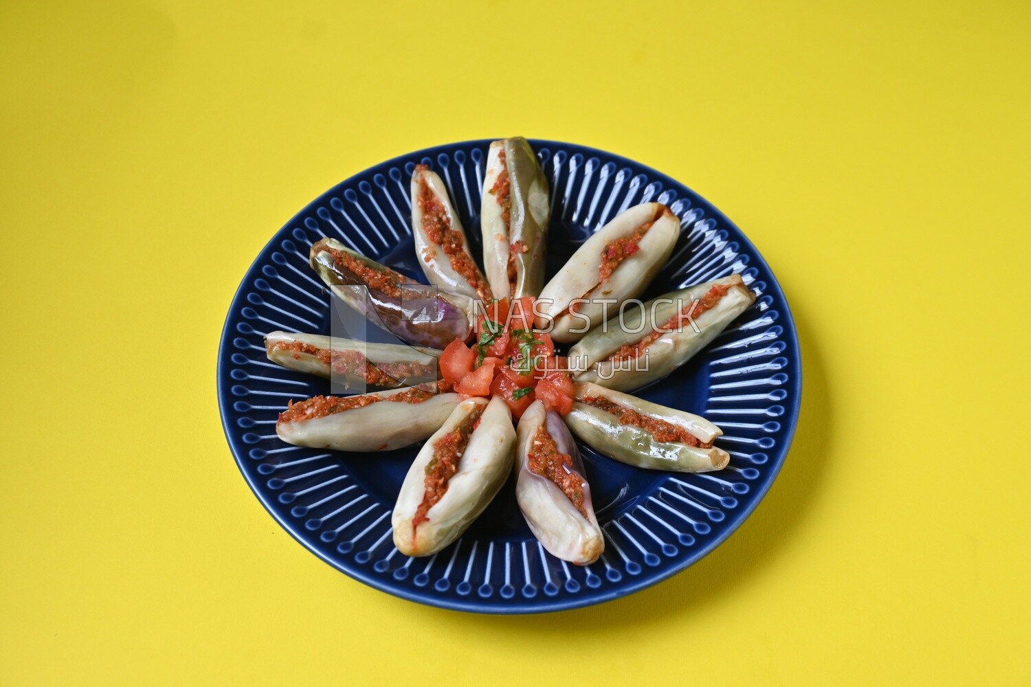 Plate of Pickled eggplant with sauce in it, Egyptian pickles, Arabic restaurants