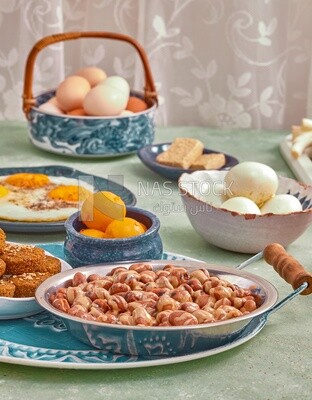 close-up of oriental breakfast, a dish of foul medames, falafel tablets, Arabic breakfast, arab restaurant