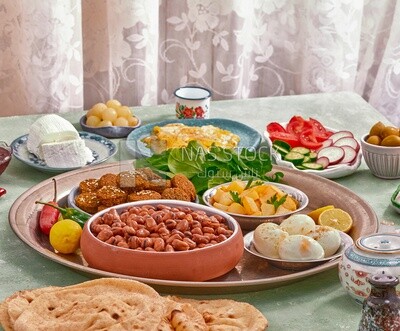 close-up of oriental breakfast, a dish of foul medames, falafel tablets, Arabic breakfast, arab restaurant